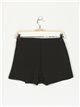 Shorts skirt with metallic detail negro