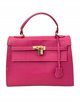 Citybag piel detalle metálico fucsia