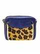 Bandolera serraje pelo animal print azul